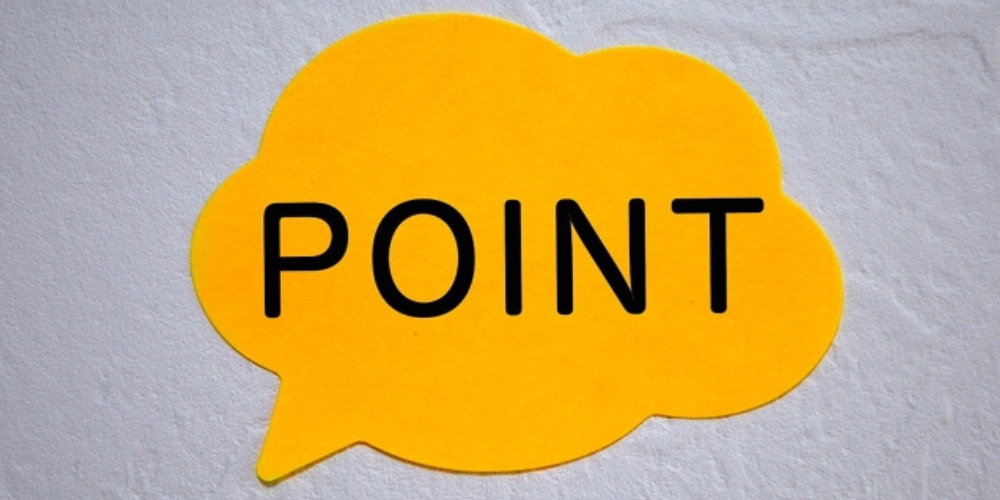 黄色い吹き出し型の紙に「POINT」と書かれているイメージ